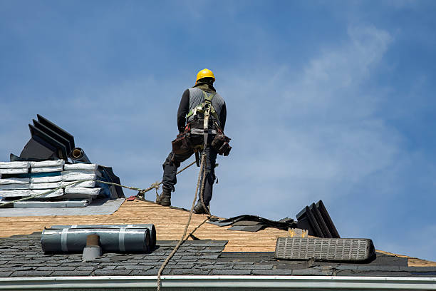 Professional Gutter Installation technician working in Klamath River, CA